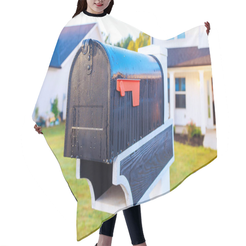 Personality  Mailbox In Front Of Contemporary House Receives Sunlight, Highlighting Its Black Surface, Vibrant Flag. Hair Cutting Cape