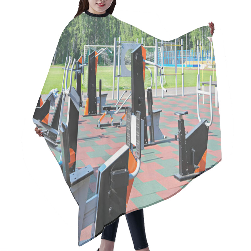 Personality  Outdoors Fitness Equipment. Sport Stadium Or Athletic Ground. Empty Training Center Outdoors. No People. Summer Sport Concept. Street Workout Gym. Public Sport Place. Hair Cutting Cape