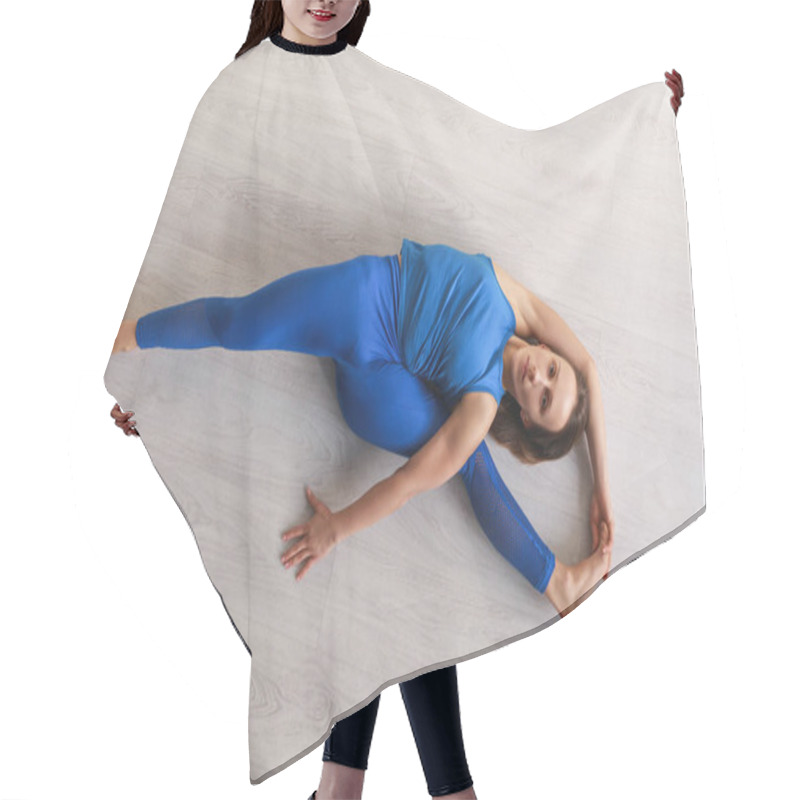 Personality  Top View Of Flexible Woman Stretching While Lying On Floor  Hair Cutting Cape