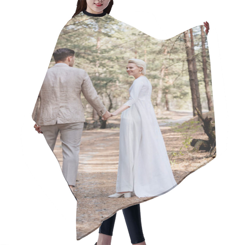 Personality  Full Length View Of Smiling Just Married Couple Holding Hands And Walking In Forest Hair Cutting Cape