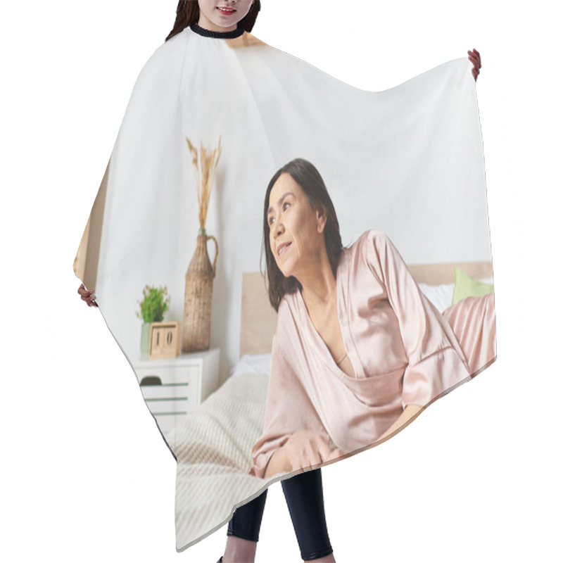 Personality  A Woman In Cozy Homewear Relaxing On A Bed In A Room. Hair Cutting Cape