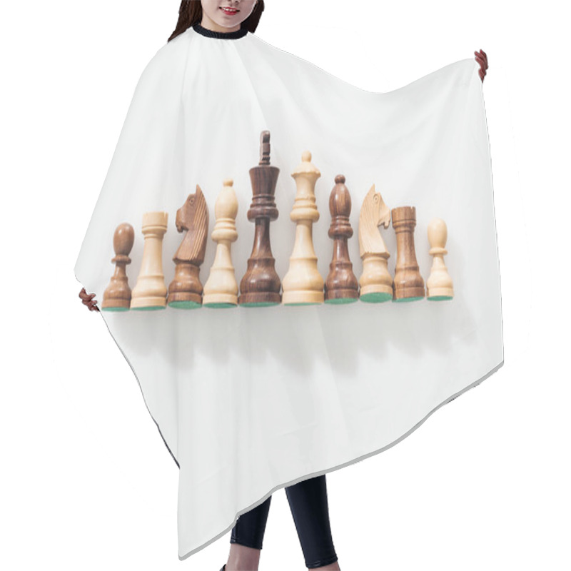 Personality  Top View Of Row Made Of Brown And Beige Wooden Chess Figures On White Background Hair Cutting Cape