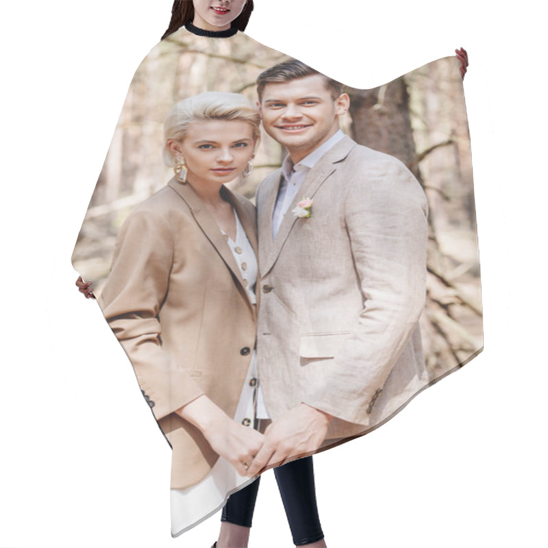 Personality  Trendy And Beautiful Couple Holding Hands In Forest Hair Cutting Cape