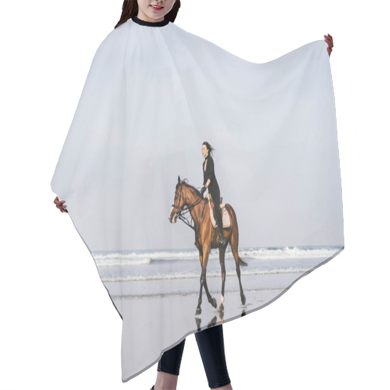 Personality  Young Female Equestrian Riding Horse On Sandy Beach Hair Cutting Cape