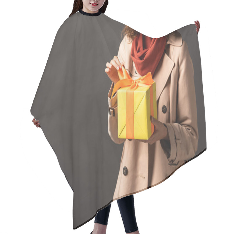 Personality  Cropped View Of Smiling Woman In Trench Coat Holding Present On Black Background Hair Cutting Cape