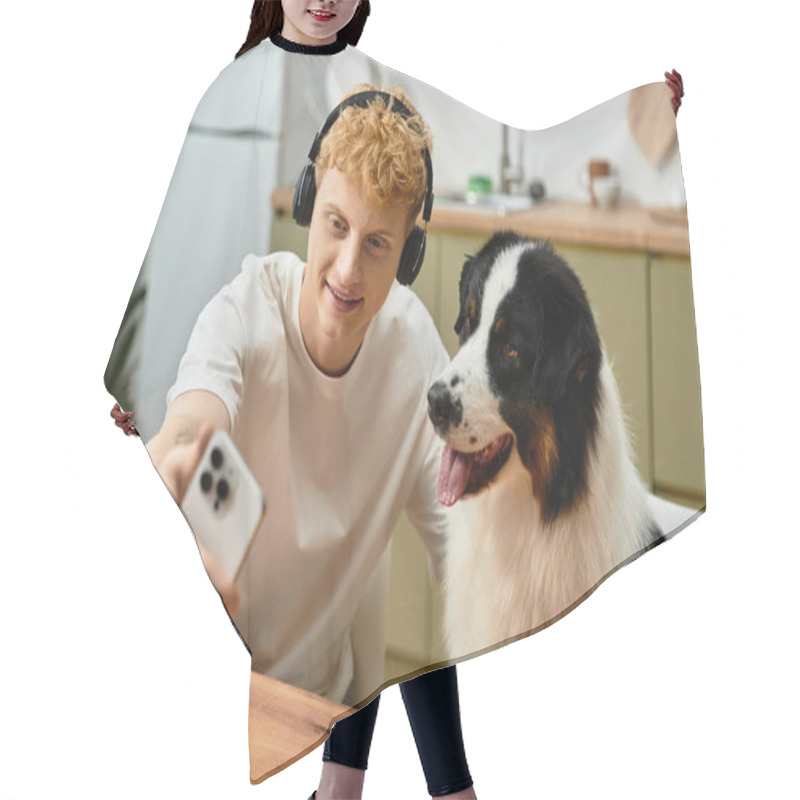 Personality  A Young Man With Red Hair Snaps A Selfie With His Cute Australian Shepherd In A Modern Apartment. Hair Cutting Cape