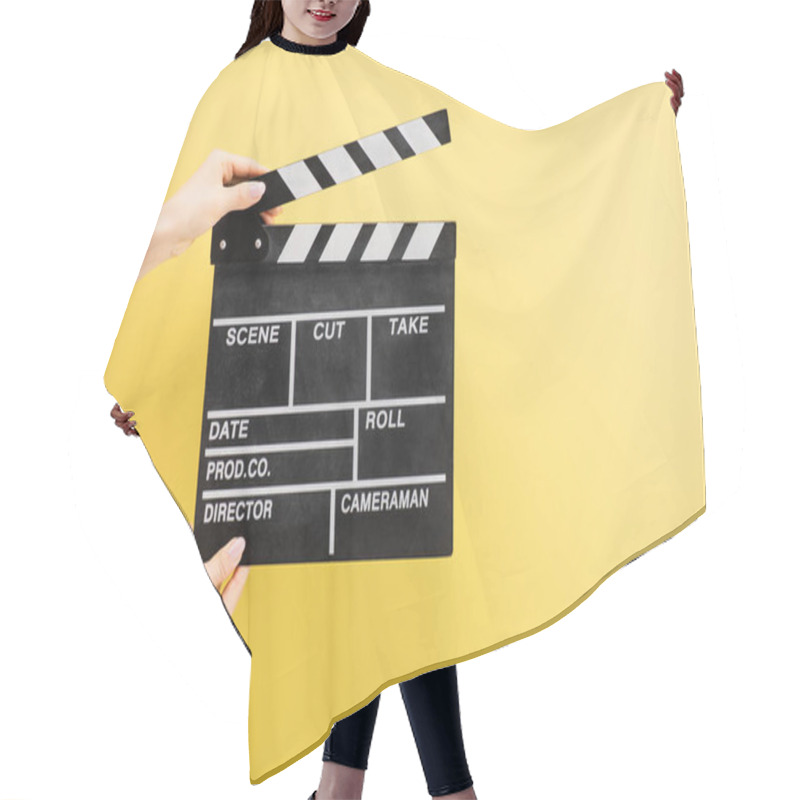 Personality  Partial View Of Camera Assistant Holding Clapperboard Isolated On Yellow, Cinema Concept Hair Cutting Cape