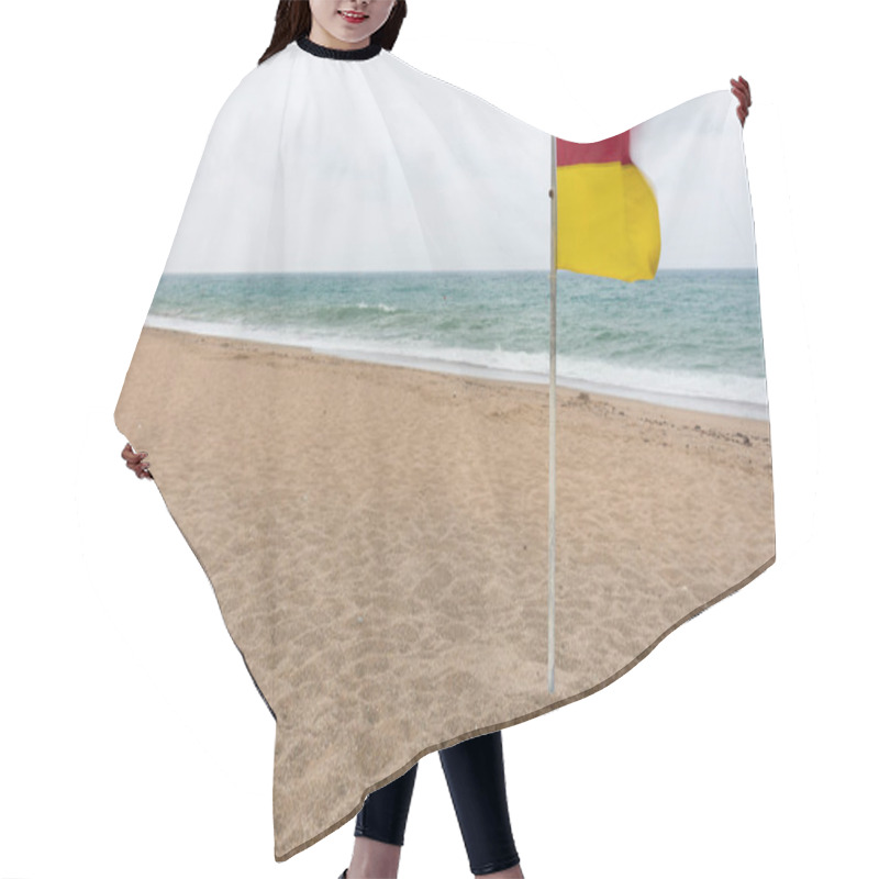 Personality  Red And Yellow Warning Flag Flying In The Wind On A Deserted Sandy Beach With Choppy Ocean On A Grey Sky Day Hair Cutting Cape