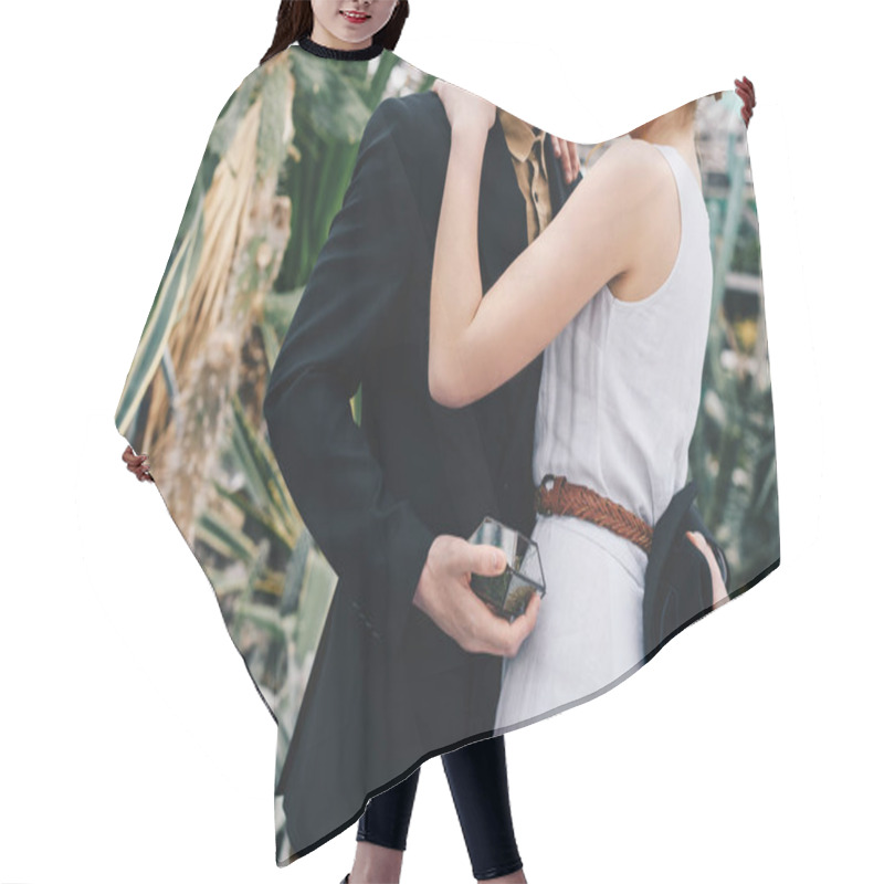 Personality  Cropped Shot Of Young Wedding Couple Hugging In Botanical Garden Hair Cutting Cape