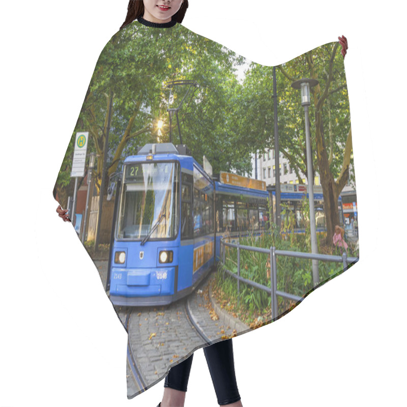 Personality  Munich, Germany, On August 16, 2018. The Modern Tram Goes On The City Street Hair Cutting Cape