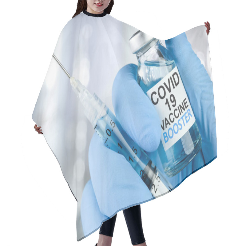 Personality  Hand In Blue Medical Gloves Holding A Syringe And Vaccine Vial With Covid 19 Vaccine Booster Text, For Coronavirus Booster Shot. Hair Cutting Cape