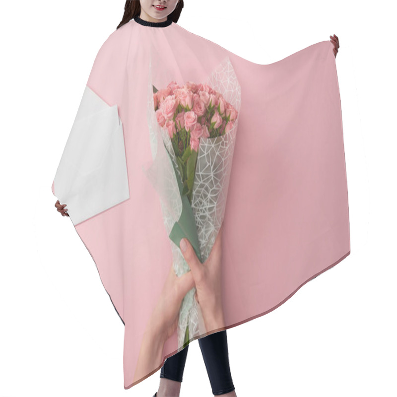 Personality  Cropped Shot Of Woman Holding Bouquet Of Beautiful Roses And White Envelope Isolated On Pink Hair Cutting Cape