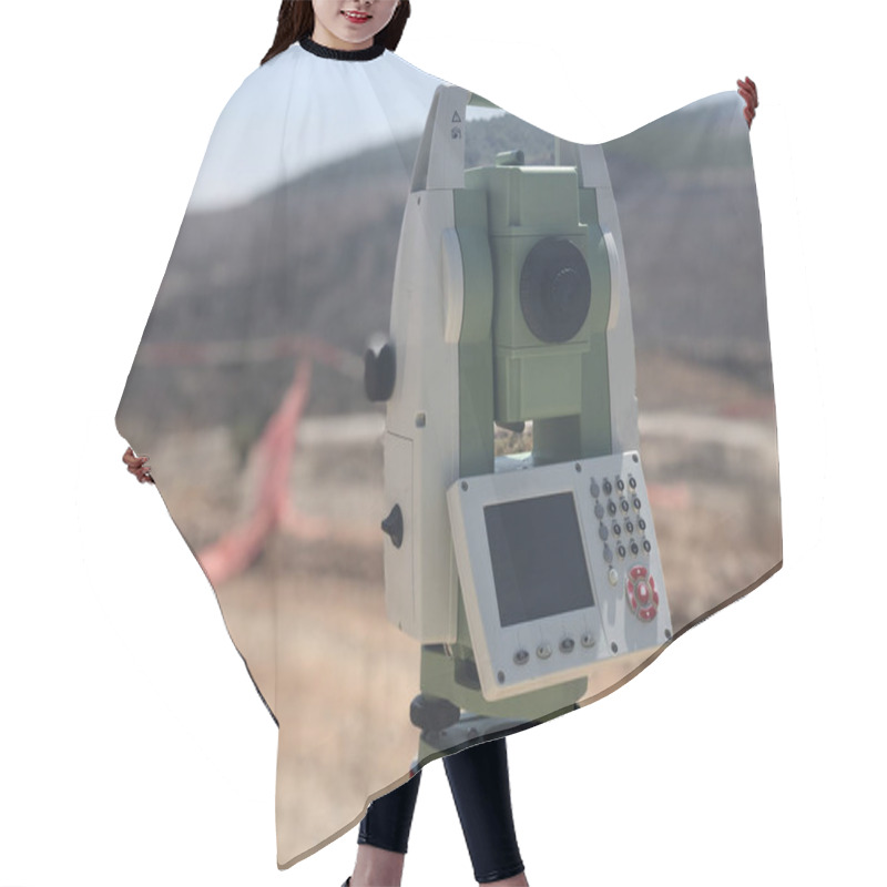 Personality  Geodetic Total Station On The Construction Site Against Blurred Background Hair Cutting Cape