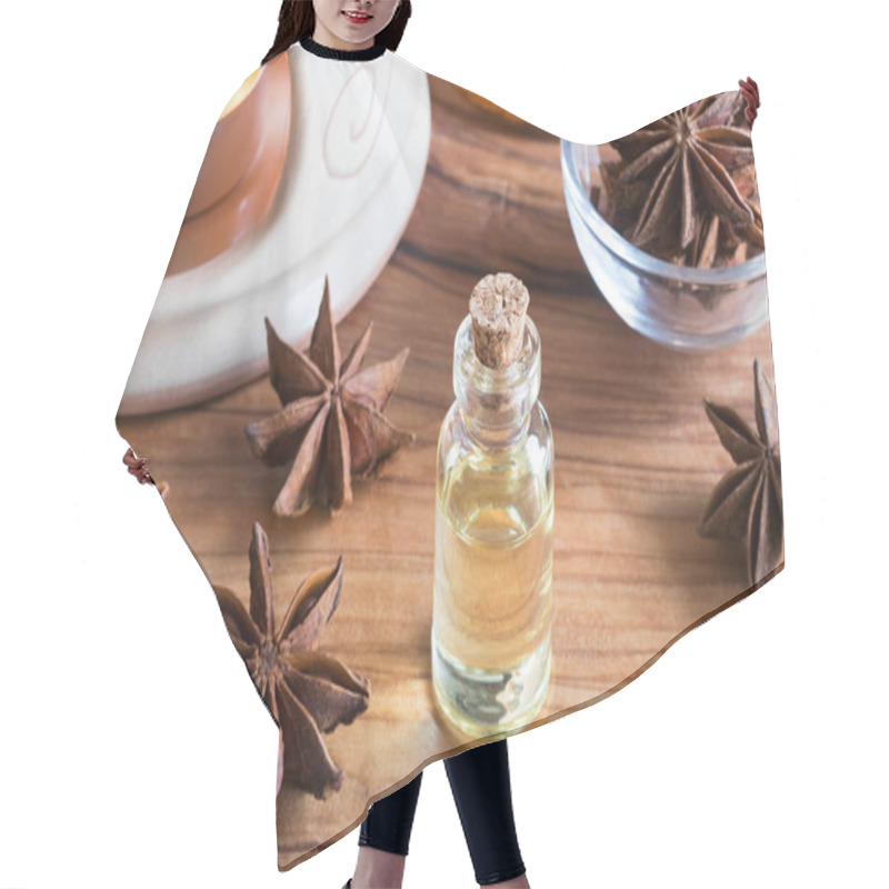 Personality  A Bottle Of Star Anise Essential Oil With Star Anise Hair Cutting Cape