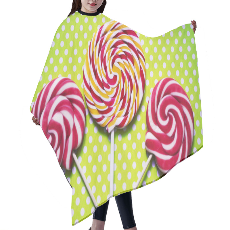 Personality  Retro Looking Photo Of Lollipops On A Green Polka Dot Background. Hair Cutting Cape