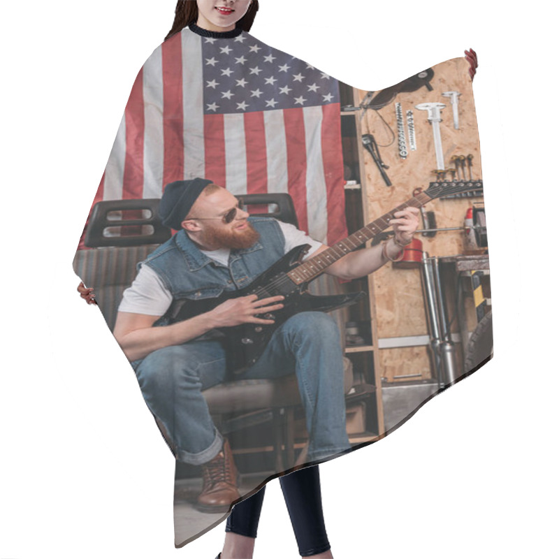 Personality  Handsome Bearded Man Playing Electric Guitar At Garage With Usa Flag Hanging On Wall Hair Cutting Cape