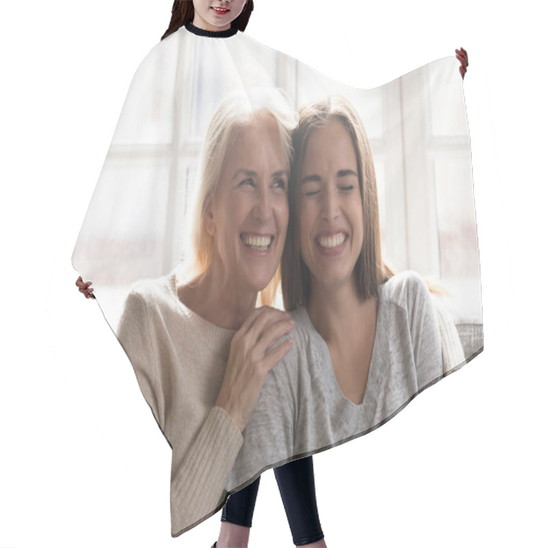 Personality  Happy Senior Mom And Adult Daughter Have Fun At Home Hair Cutting Cape