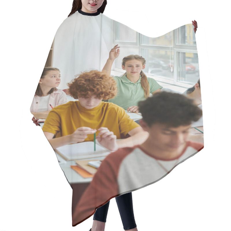 Personality  Teenage Schoolgirl Raising Hand And Talking Near Devices And Classmates During Lesson In School Hair Cutting Cape