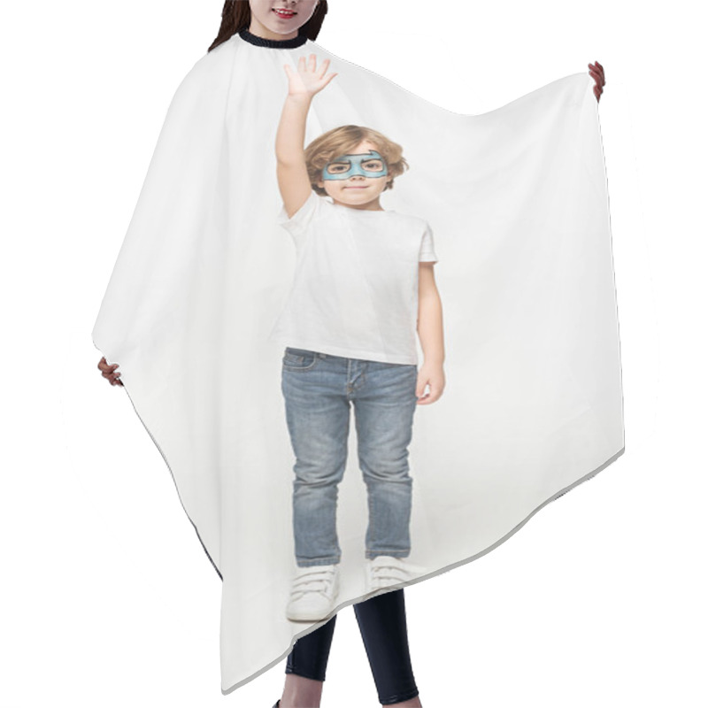 Personality  Full Length View Of Smiling Boy With Superhero Mask Painted On Face Standing With Raised Hand On White Background Hair Cutting Cape