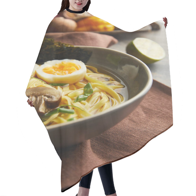 Personality  Close Up View Of Traditional Spicy Ramen In Bowl On Brown Napkin On Stone Surface Hair Cutting Cape