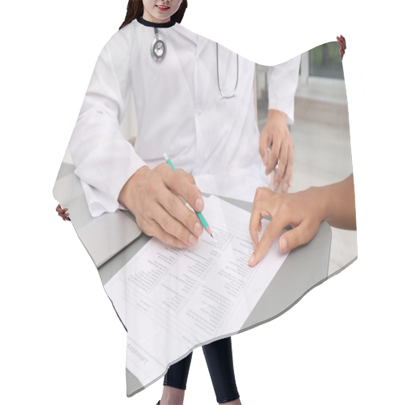 Personality  Male Doctor Working With Patient At Table In Hospital, Closeup Hair Cutting Cape