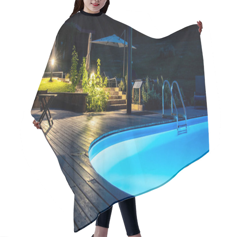 Personality  Luxurious Nighttime Outdoor Setting Featuring A Brilliantly Lit Pool With LED Lights Creating A Serene Blue Glow, Surrounded By An Illuminated Garden And Cozy Poolside Essentials. Hair Cutting Cape