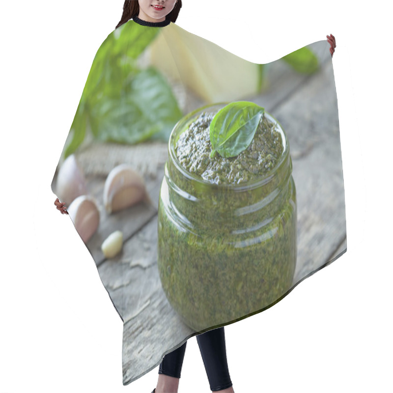 Personality  Homemade Traditional Mediterranean  Healthy Sauce In Glass. Basil, Parmesan, Nuts And Olive Oil. Vintage Wooden Table Background. Hair Cutting Cape