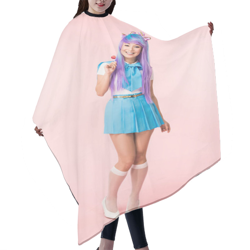 Personality  Full Length View Of Smiling Asian Otaku Girl Holding Lollipop On Pink Hair Cutting Cape