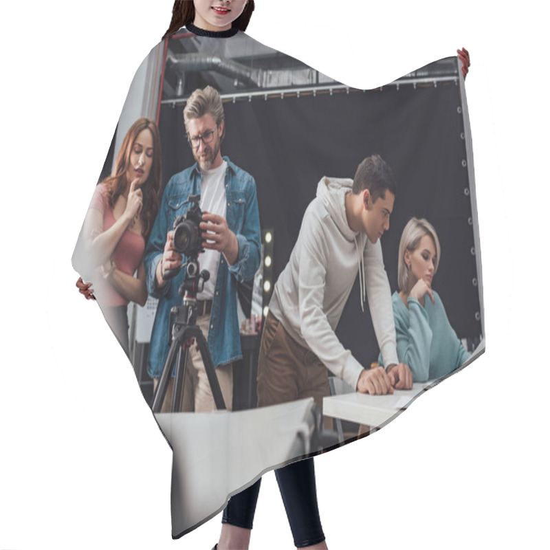 Personality  Selective Focus Of Art Director Standing Near Photographer And Coworkers  Hair Cutting Cape