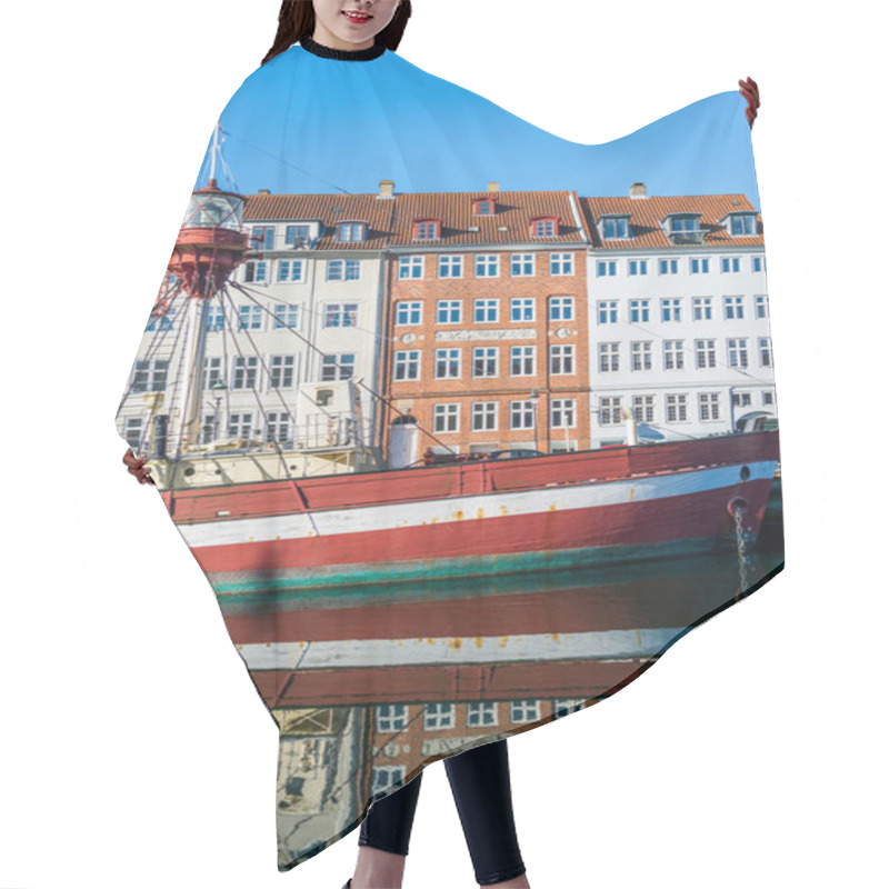 Personality  COPENHAGEN, DENMARK - 06 MAY, 2018: boat and houses reflected in water at Nyhavn pier, copenhagen, denmark hair cutting cape