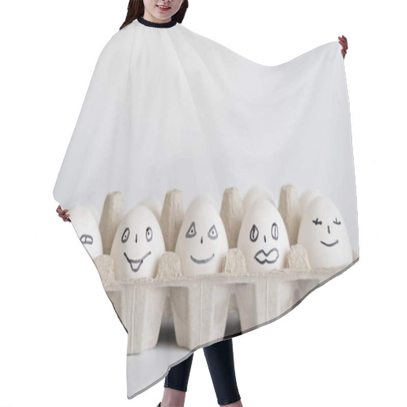 Personality  Painted Chicken Eggs With Facial Expressions In Tray On White Background  Hair Cutting Cape