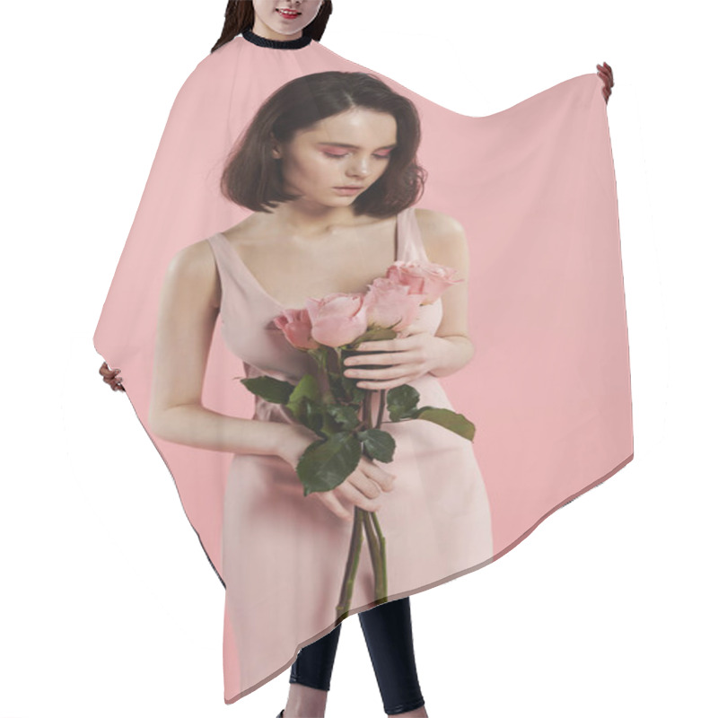 Personality  A Woman In A Pink Dress Holds A Bouquet Of Roses In Front Of A Bright Pink Background. Hair Cutting Cape