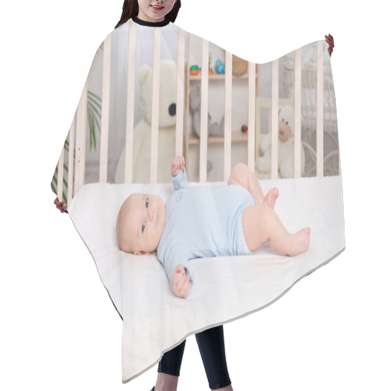 Personality  Baby In The Crib, Cute Little Boy Of Six Months Lying In The Nursery On The Bed Hair Cutting Cape