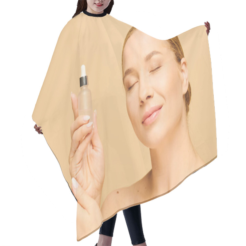 Personality  The Young Plus Size Woman Smiles Gently While Holding A Serum Bottle, Radiating Confidence. Hair Cutting Cape