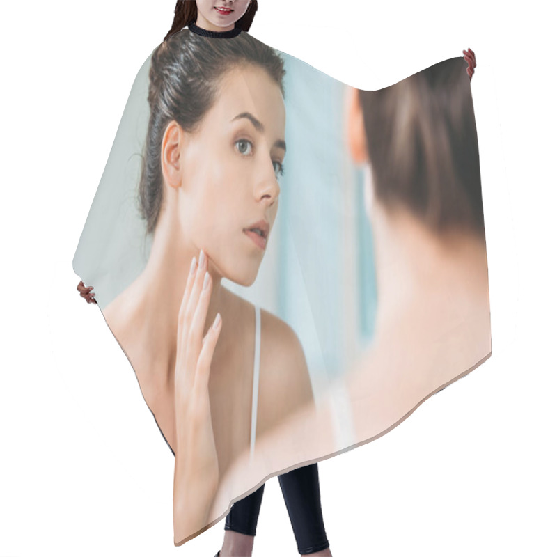 Personality  Selective Focus Of Attractive Young Woman Touching Face And Looking At Mirror Hair Cutting Cape