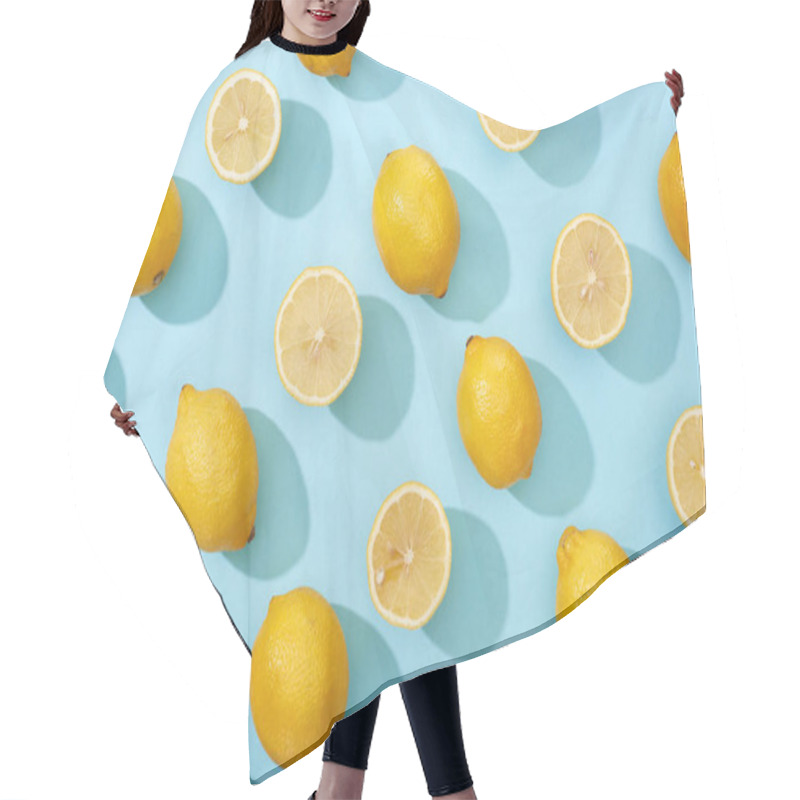 Personality  Top View Of Whole And Cut Yellow Lemons On Blue Background Hair Cutting Cape