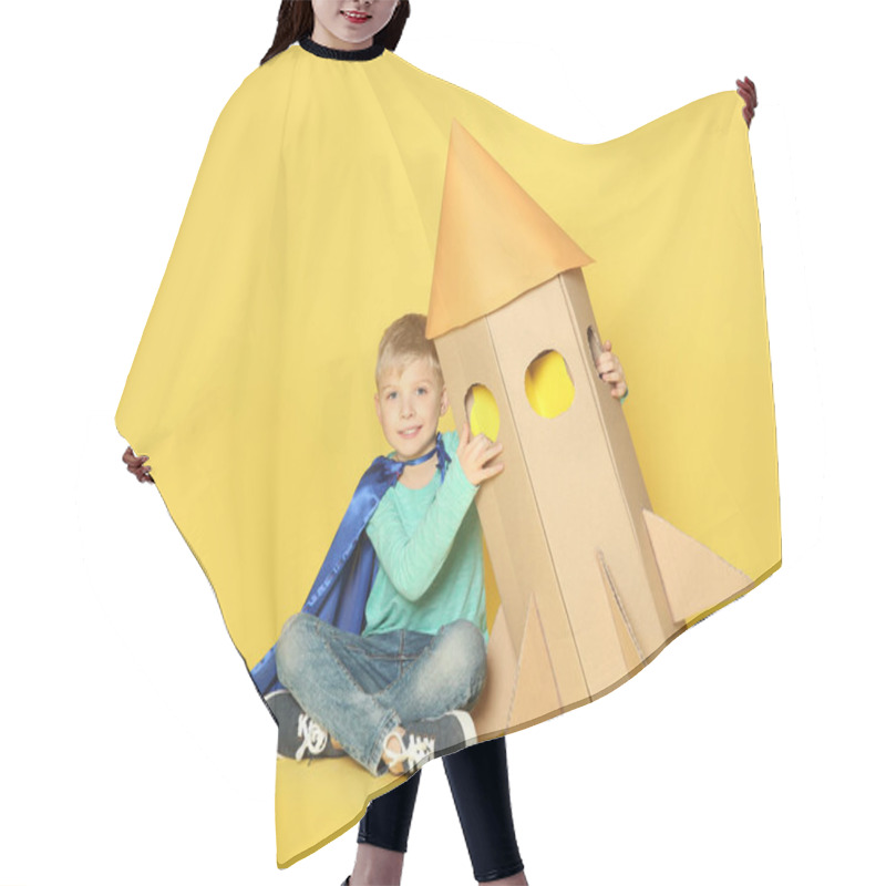 Personality  Little Child In Cape Playing With Rocket Made Of Cardboard Box On Yellow Background Hair Cutting Cape