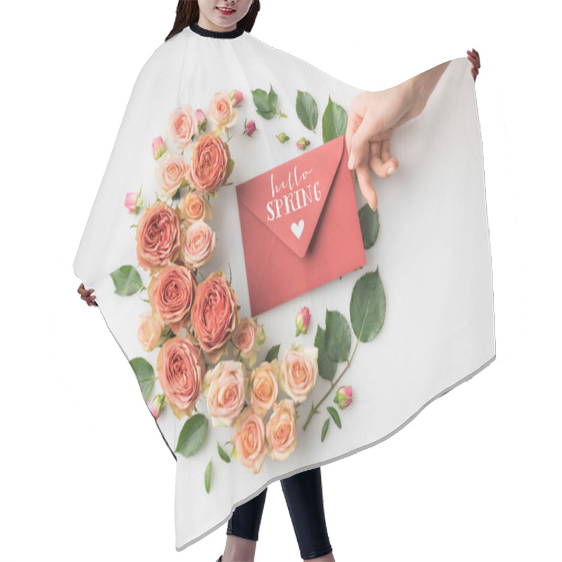 Personality  Hand Holding Envelope With HELLO SPRING Lettering Surrounded By Beautiful Pink Flowers Isolated On White Hair Cutting Cape