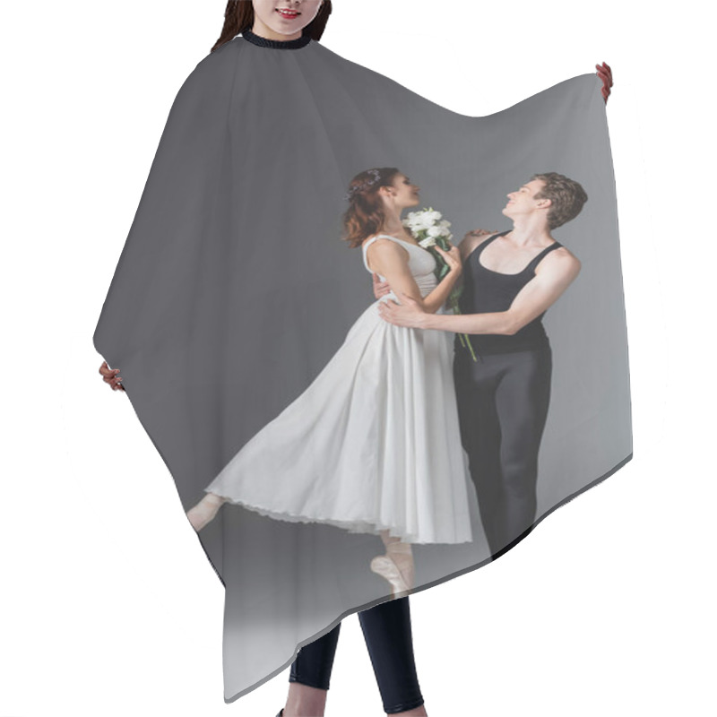 Personality  Full Length Of Graceful Ballerina In White Dress Holding Flowers And Dancing With Partner On Dark Grey Hair Cutting Cape