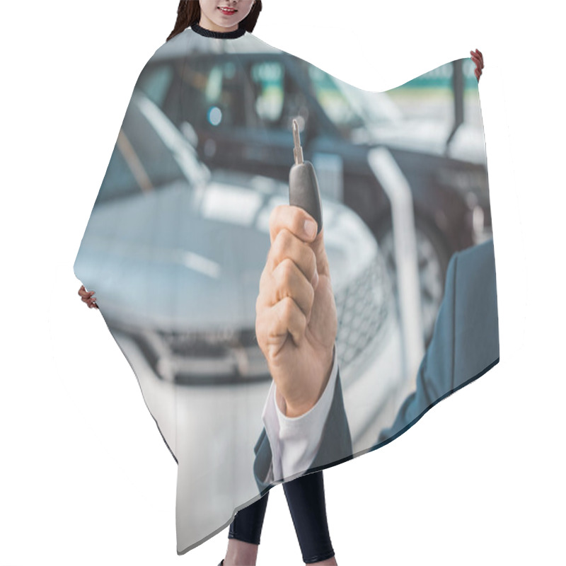 Personality  Cropped Shot Of Businessman With Car Key In Hand In Dealership Salon Hair Cutting Cape