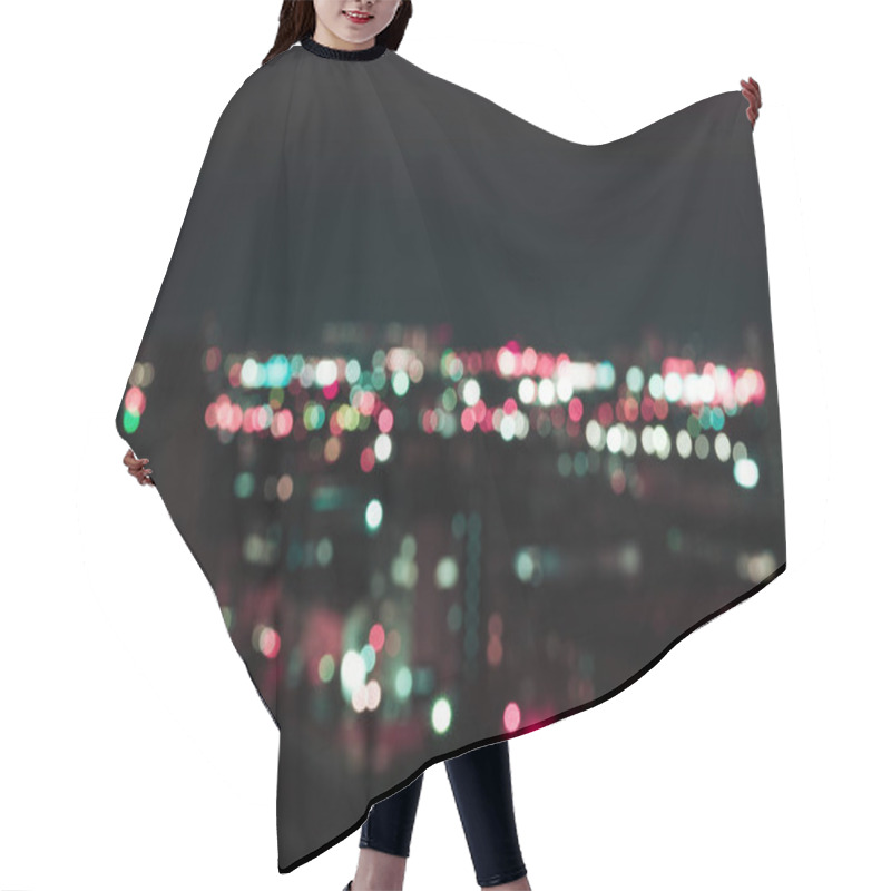 Personality  Defocused Dark Background With Bright Bokeh Lights At Night  Hair Cutting Cape