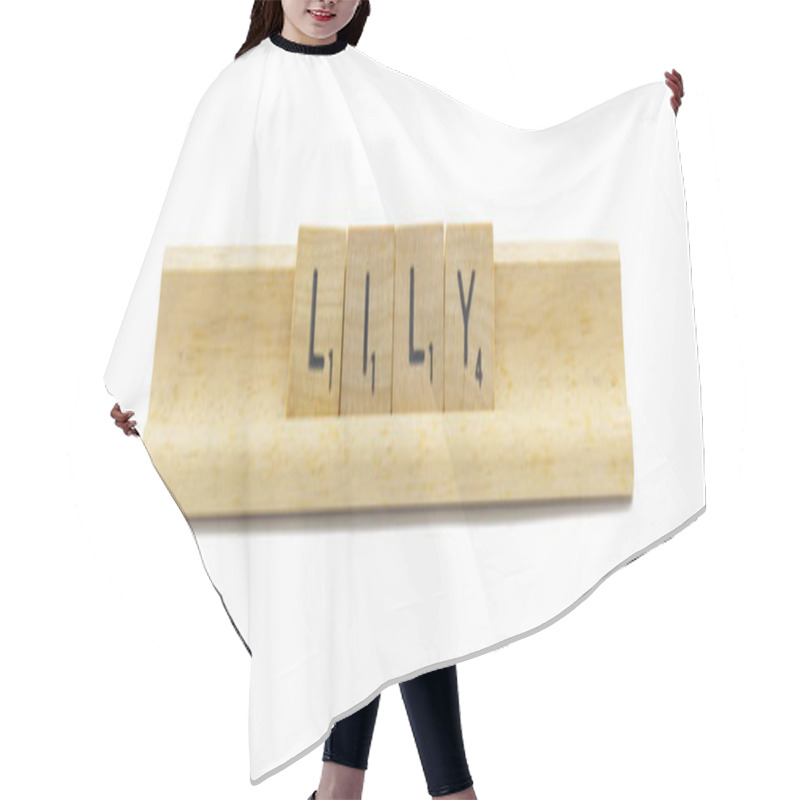 Personality  Concept Of Popular Newborn Baby Girl First Name Of LILY Made With Square Wooden Tile English Alphabet Letters With Natural Color And Grain On A Wood Rack Holder Isolated On White Background Hair Cutting Cape