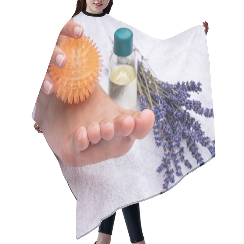 Personality  Foot Reflexology Massage With Massage Ball In A Practice Hair Cutting Cape