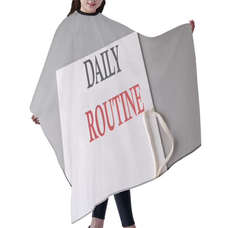 Personality  DAILY ROUTINE Text On White Folder On Grey Background Hair Cutting Cape