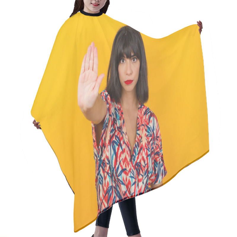 Personality  Young Beautiful Caucasian Woman Doing Stop Gesture With Palm Of The Hand. Warning Expression With Negative And Serious Gesture On The Face Over Background. Hair Cutting Cape