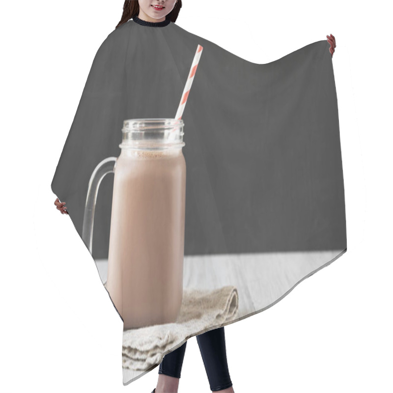 Personality  Homemade New England Chocolate Milkshake In A Glass Jar Mug On A White Wooden Background, Side View. Copy Space. Hair Cutting Cape