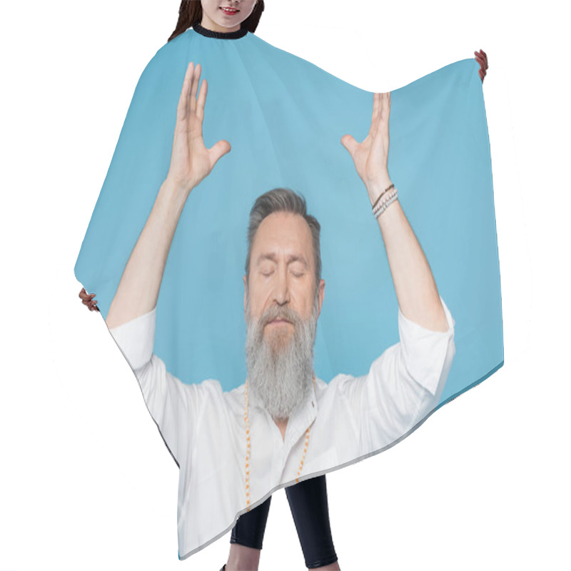 Personality  Bearded Guru Man Meditating With Closed Eyes And Raised Hands Isolated On Blue Hair Cutting Cape