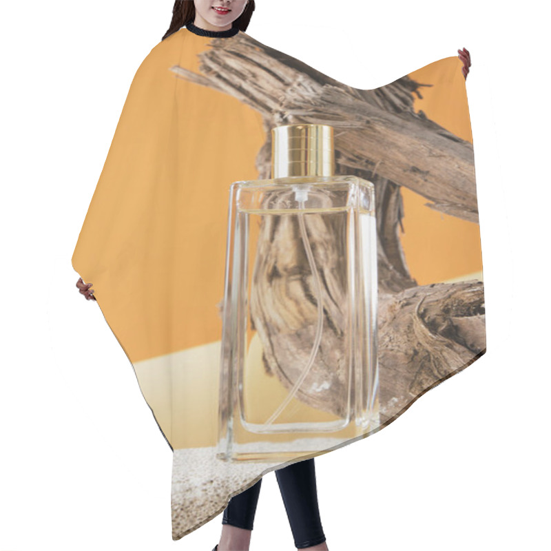 Personality  Glass Bottle Of Perfume On A Concrete Podium, Against A Background Of Driftwood, Natural Shade Background Hair Cutting Cape