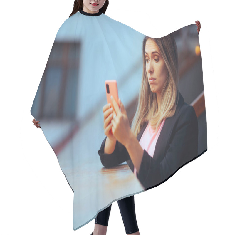 Personality  Puzzled Businesswoman Reading A Text Message On Her Smartphone Hair Cutting Cape