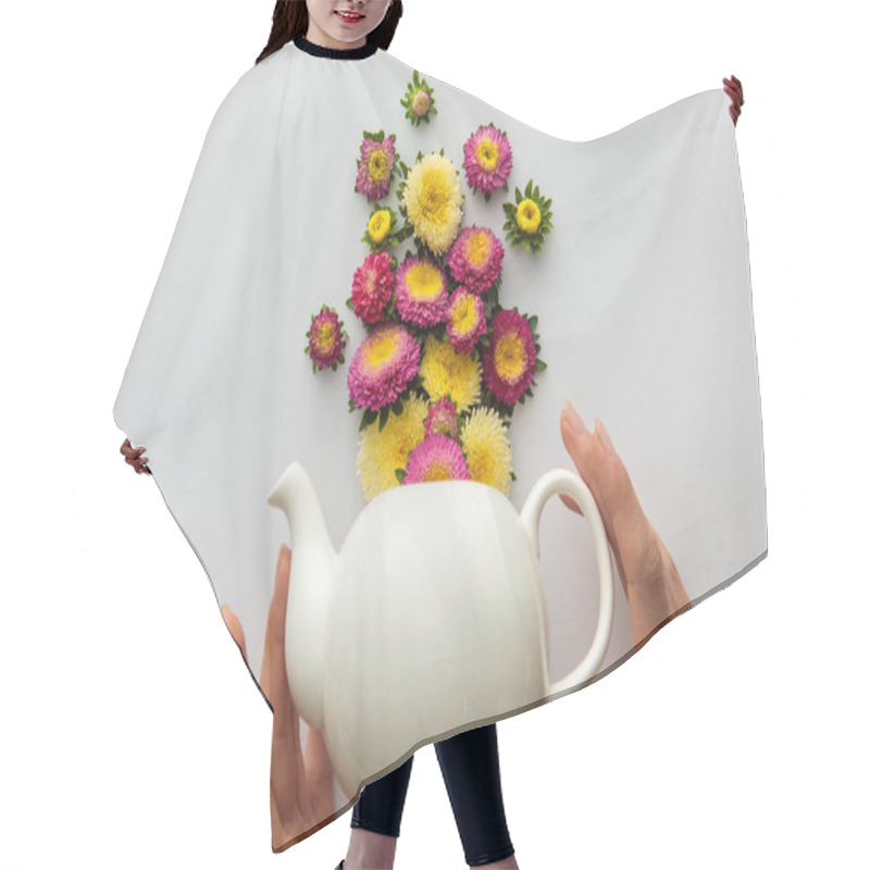 Personality  Cropped View Of Woman Holding Teapot  Near Asters On White Background Hair Cutting Cape